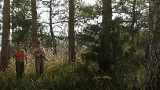 Mount Kalaga National Park, official still: Hunters in the pines