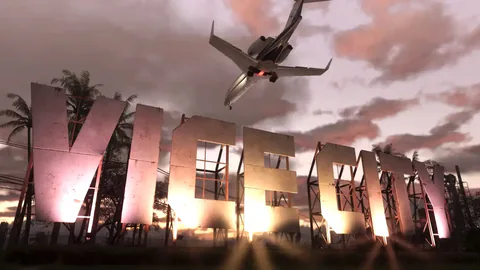 The giant illuminated VICE CITY letters stand on a hillside at sunset as a passenger jet flies overhead in Grand Theft Auto VI.