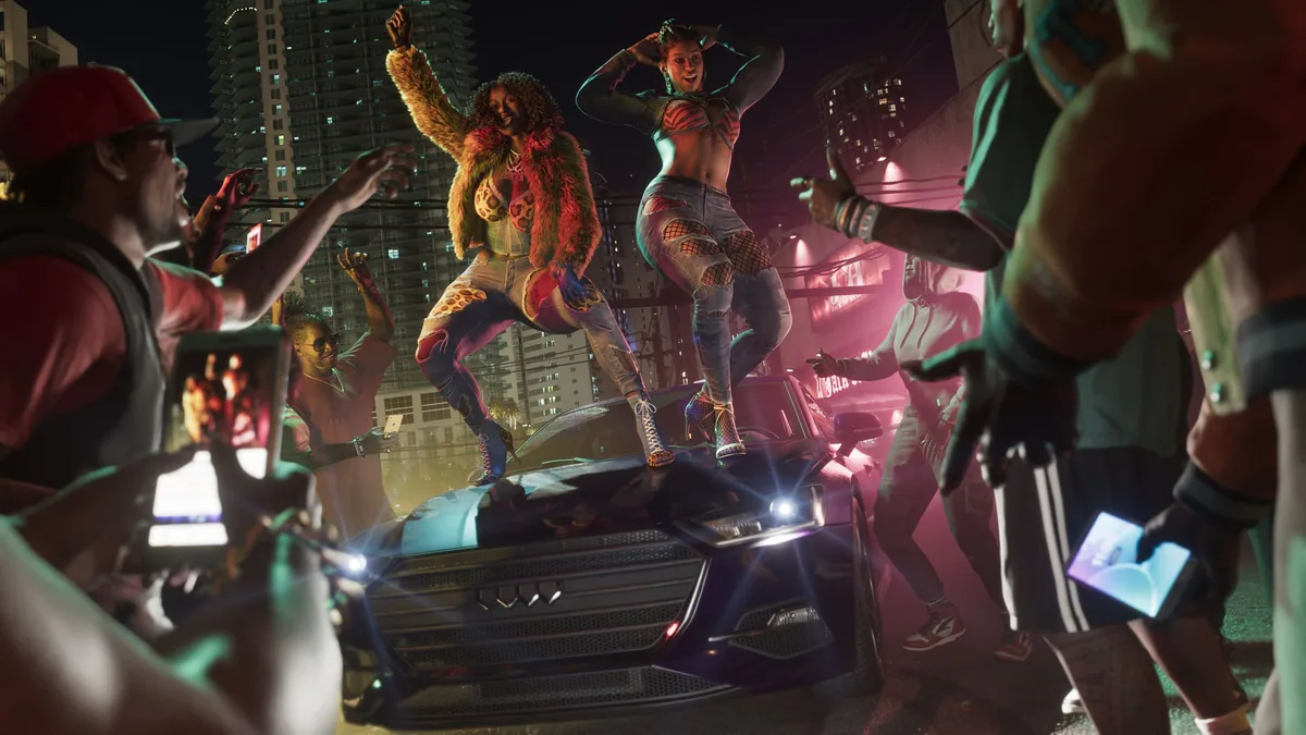 Real Dimez dance on a car surrounded by a nighttime Vice City crowd.