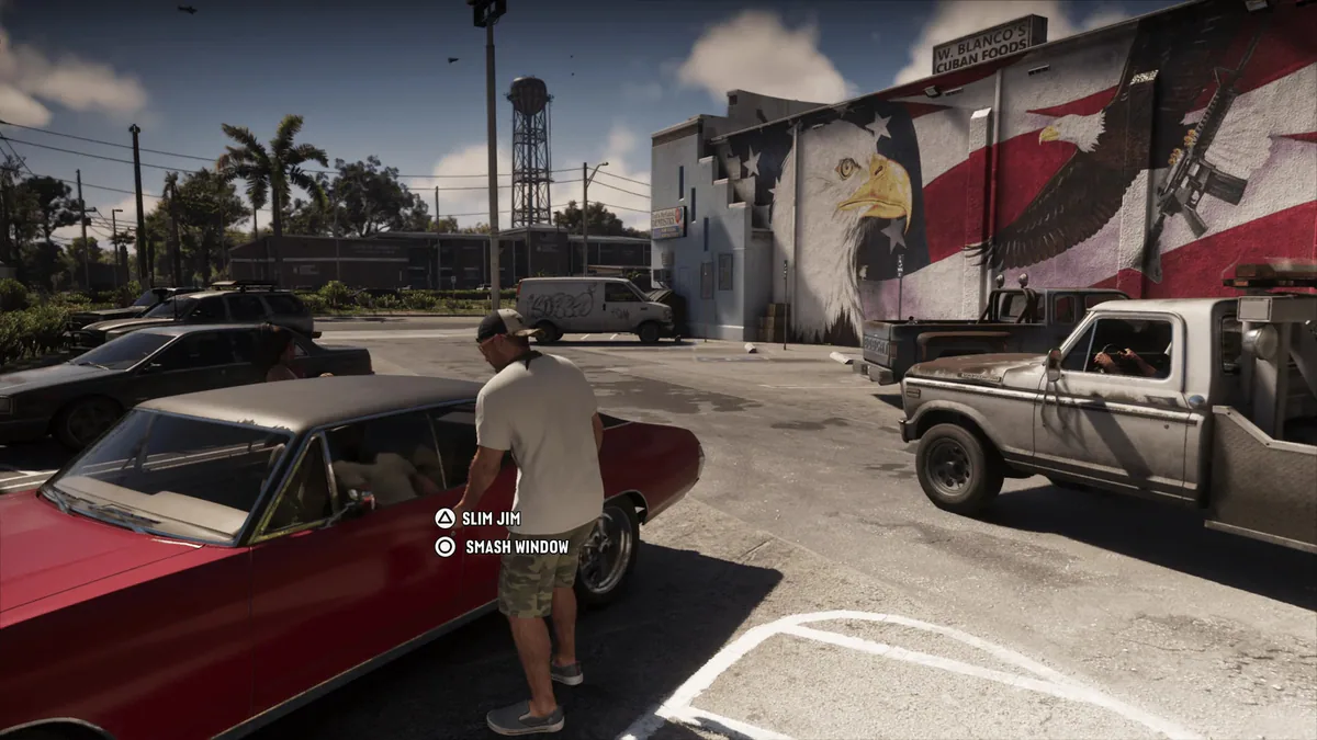 Several vehicles, including a red convertible and a pickup truck, occupy the roadside parking area beside a building in GTA VI.