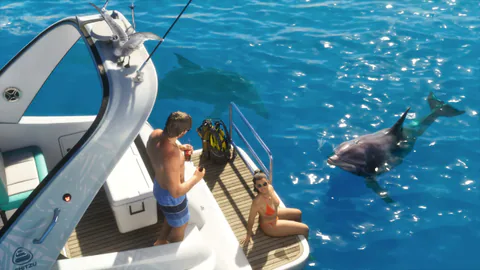 GTA VI screenshot shows a boat on clear water with people preparing for an ocean activity near a dolphin.