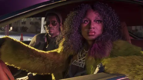 In the passenger seat while Roxy of the Real Dimez drives.