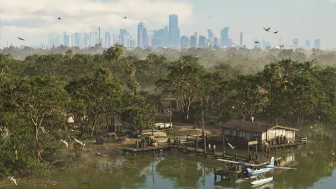 Stilt houses and a moored seaplane, a skyline far off beyond the trees.
